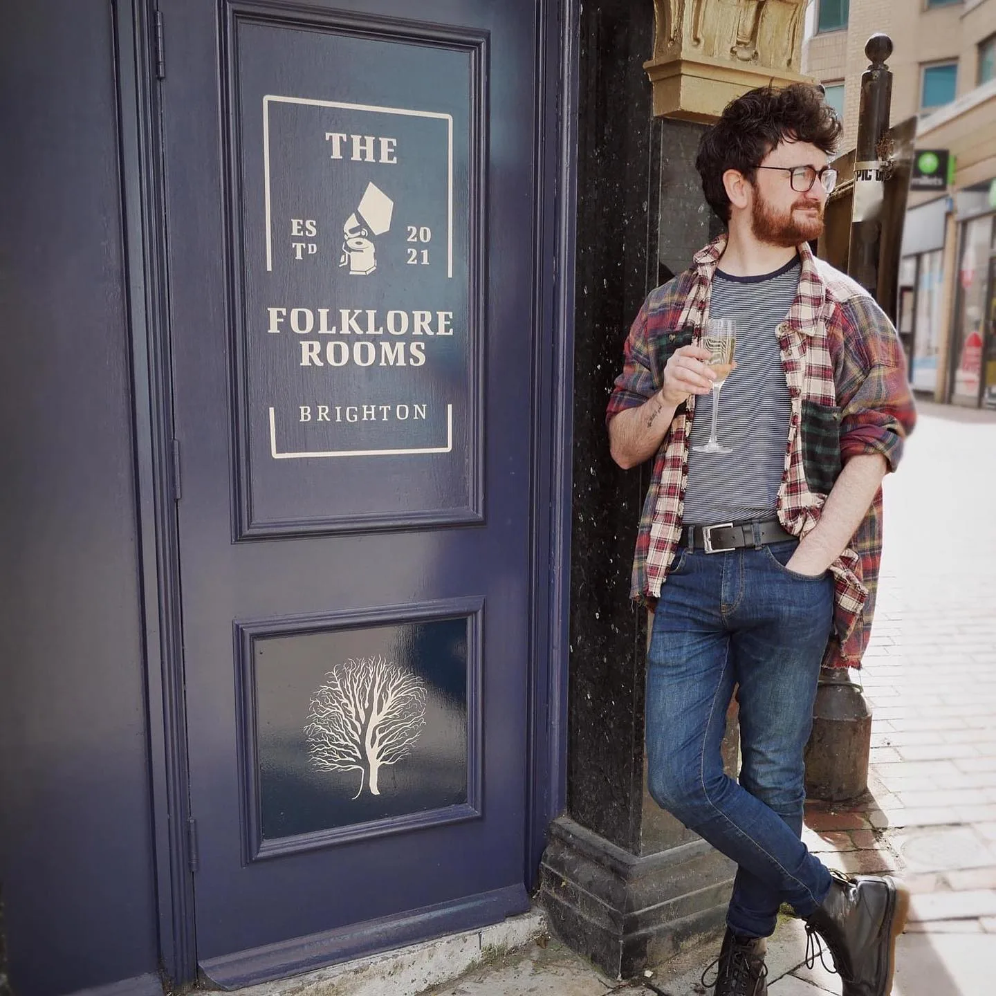 Scott C. Booth at the door of The Folklore Rooms